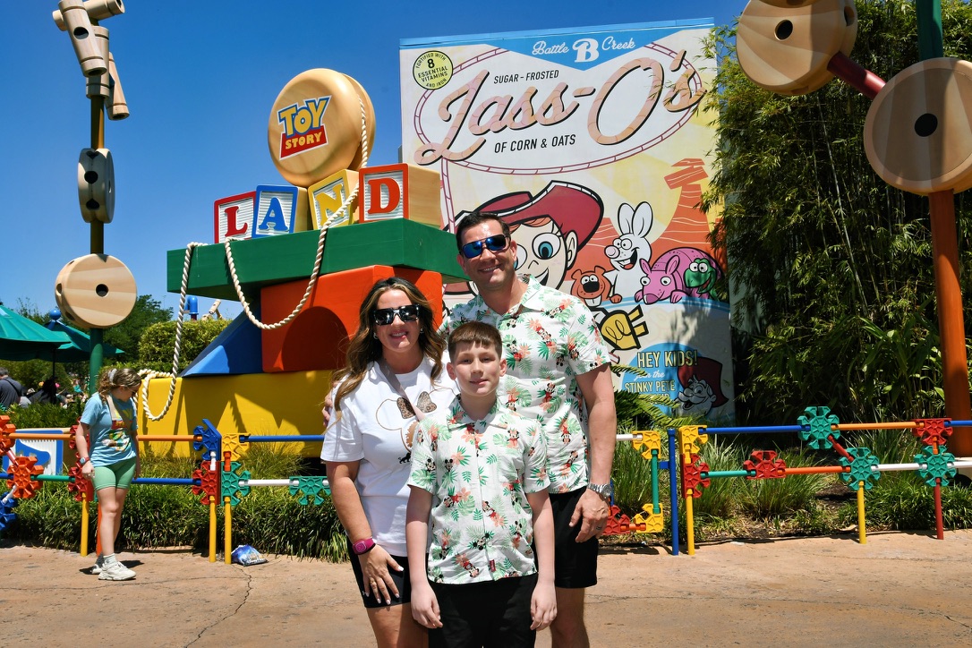 Heather and Steven Martinez with their three children on a wooden bridge